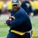 Blue Team player Allen Jefferson catches a pass during the alumni spring flag football game on Saturday, April 13. AnnArbor.com I Daniel Brenner